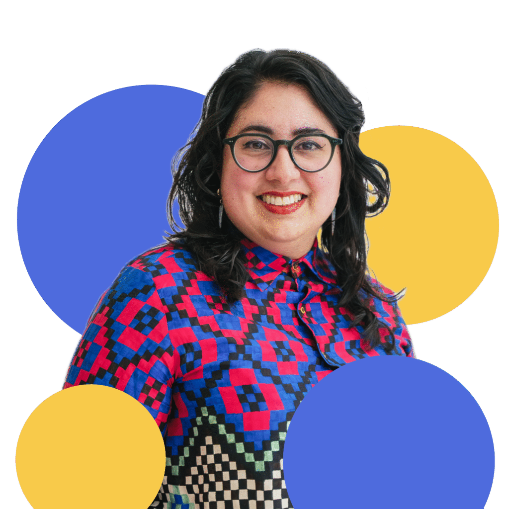 PDC - hero image 2 Coach Parveen, surrounded by blue and yellow circles